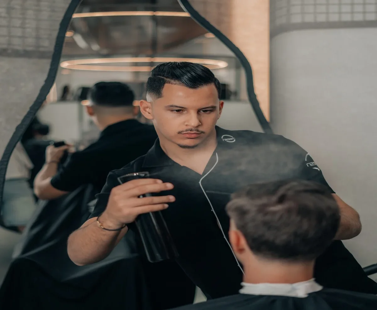 reset men salon barber cutting hair